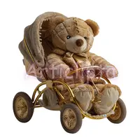 Watercolor teddy bear sitting in a vintage luxury gold stroller. Elegant nursery toy illustration suitable for high-end baby shower designs.