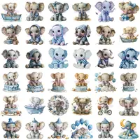 Watercolor Baby Elephant Clipart Bundle grid view showing 36 adorable elephants in blue pajamas, hats, and bows, sitting on clouds or cakes. Ideal high-quality isolated PNGs for sublimation and nursery decor.