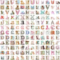 Full collection preview of the Watercolor Easter Alphabet Clipart Bundle featuring all letters decorated with adorable Labrador puppies, eggs, and spring decor. Perfect for scrapbooking, stickers, and planner layouts.