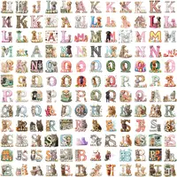 Grid view of the Easter Dog Alphabet Letters K through Z, featuring Labrador puppies and other breeds with decorative eggs. Full collection preview of transparent PNGs.