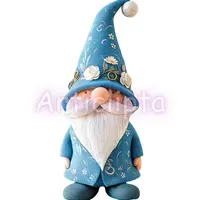 Watercolor blue wedding gnome wearing pointed hat with white flowers and gold jewelry accents. Magical bridal dwarf isolated PNG for scrapbooking.