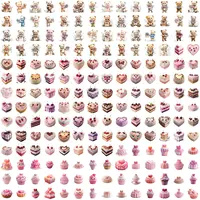 Valentine's Day Mega Clipart Bundle grid view showing rows of cute teddy bears holding flowers, heart-shaped cakes, and pink/red cupcakes. Assortment of sweet treats for digital scrapbooking.