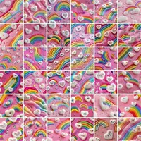 Grid view showing variety of pastel rainbow and heart chenille patch designs. Textured pink assortment perfect for baby shower decor and fabric printing.